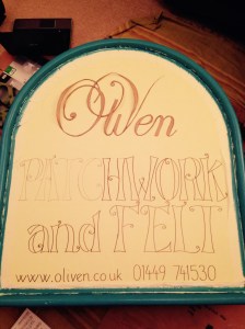 painting sign for oliven