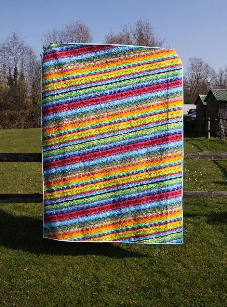 off centered backing Om Quilt